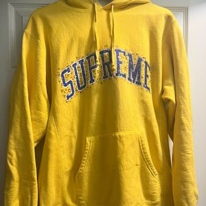 Yellow supreme water arc hooded sweatshirt size large. lightly used, no stains.